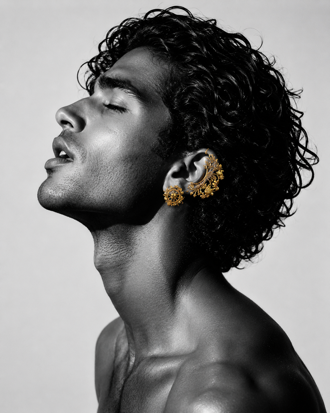 Profile with gold ear jewel