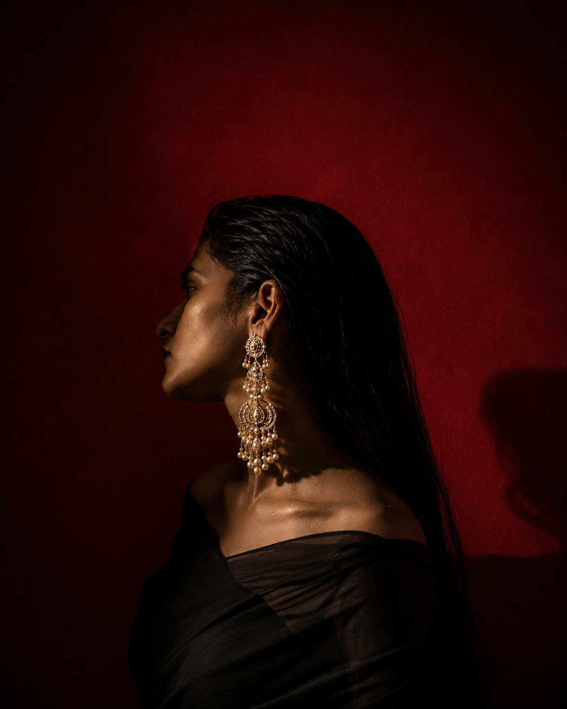 Profile with gold earring